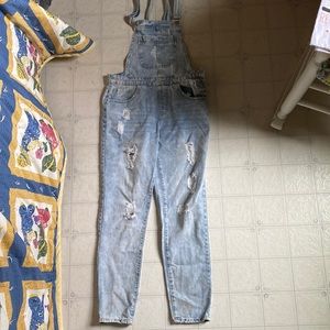 Ripped overalls.
